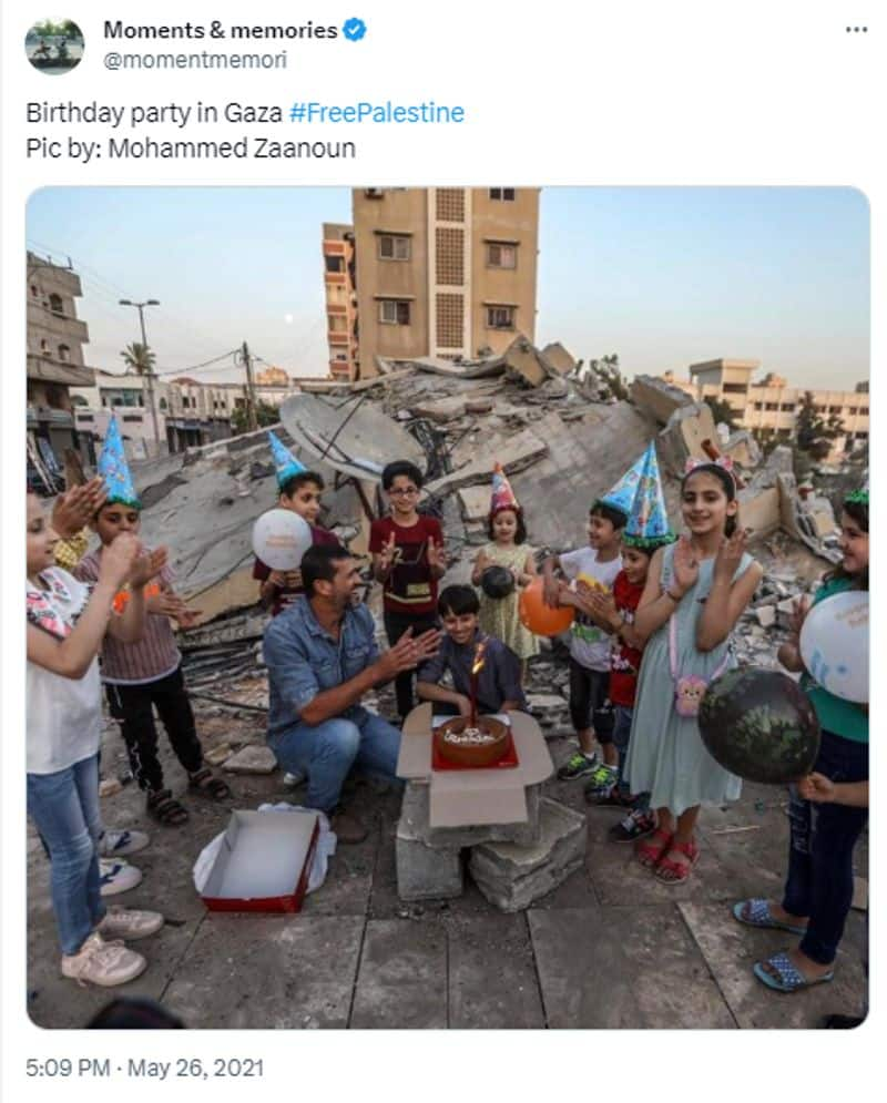 photo of boy celebrating birthday in Gaza near his destroyed house is old jje 