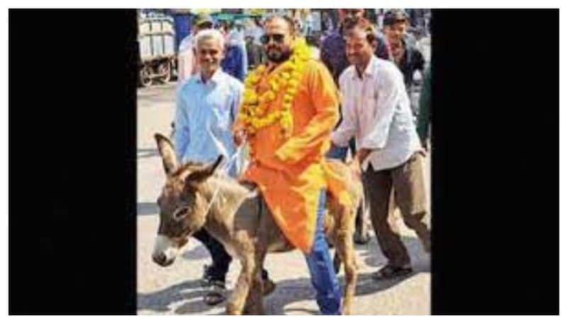 independent candidate ride on donkey to file nomination prm