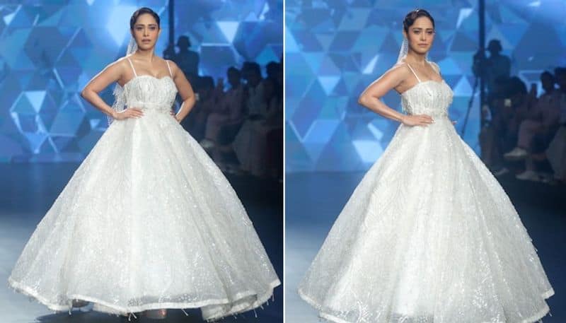 Nushrratt Bharuccha walks the ramp in a dreamy white gown RKK