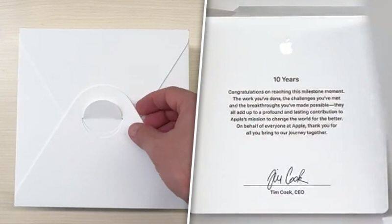 Apple employee receives award from CEO Tim Cook after working 10 years watch unboxing video gcw