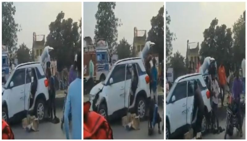 Video of crowd looted bottles of alcohol from the car that was in an accident went viral bkg 