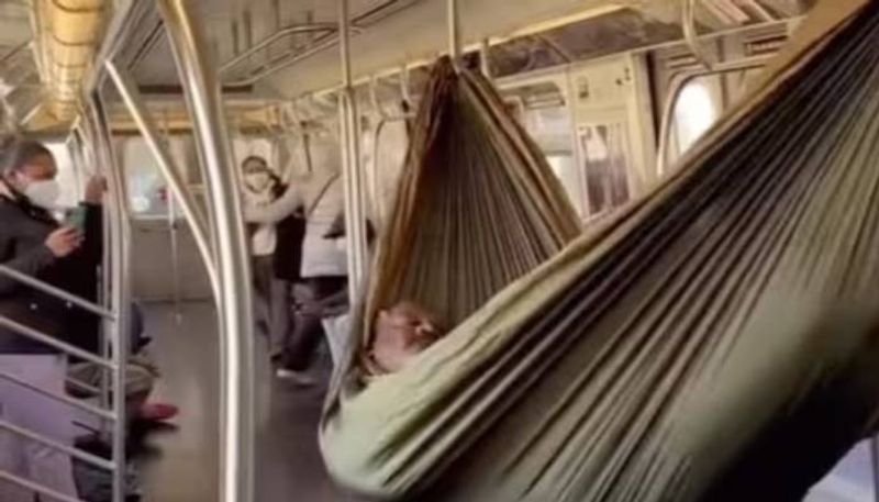 man in hammock video from new york subway viral rlp