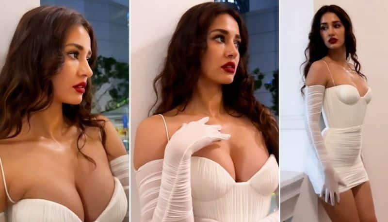 Disha Patani raises temperatures in white, bold dress; flaunts cleavage in viral video [PICTURES] ATG