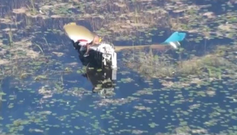 pilot gets narrow rescue from alligator infested swamp after crashing flight etj