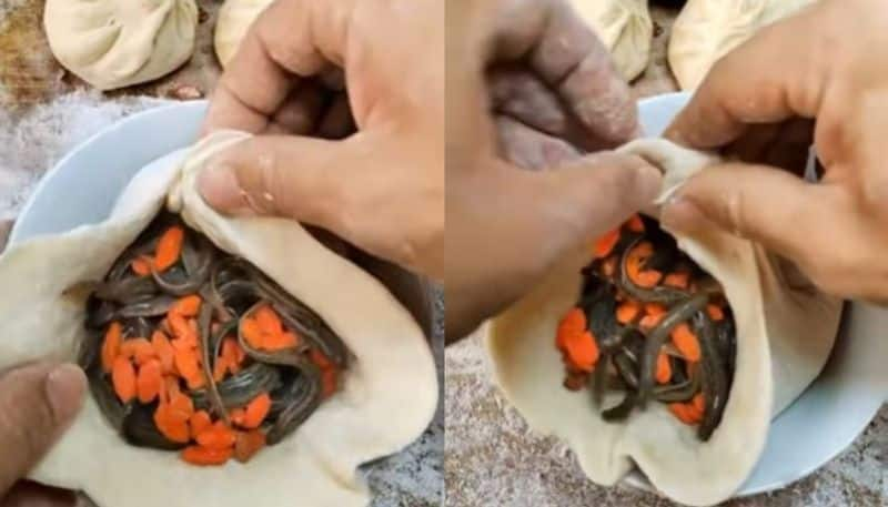 man stuffing live worms inside momos viral video-rse- 