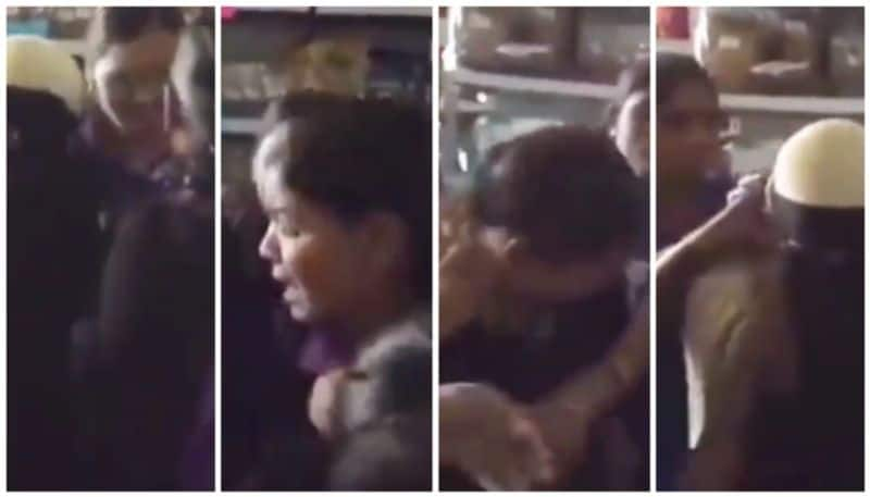 video of two women taking off their veils on social media after being accused of theft bkg