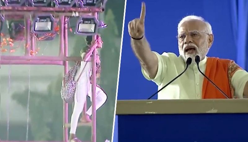 beta neeche aao pm modi tells girl who climbed light tower at rally ash