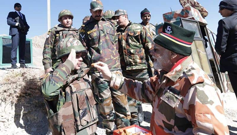 PM Narendra Modi celebrates 'festival of lights' with forces at Lepcha near China border