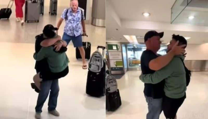 jumping for joy video of son and father meeting after several years rlp