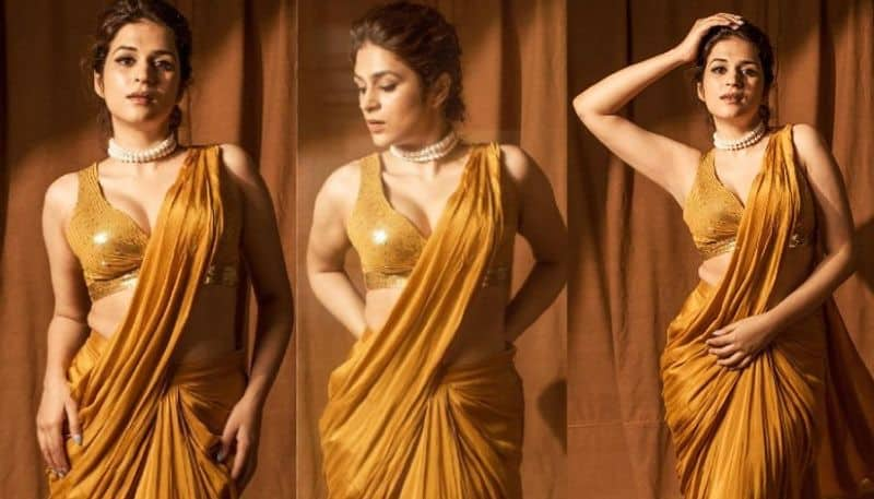 Shraddha Das beautiful stills in  gold color Saree NSK 