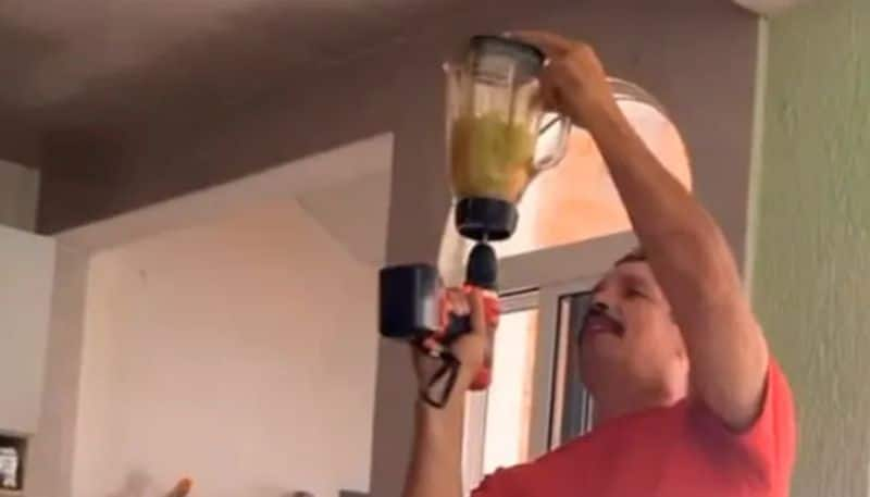 man making juice by using a drilling machine the video going viral