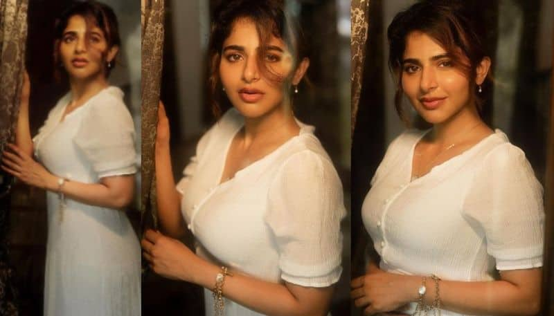 Iswarya Menon looks beautiful in white chudidar NSK