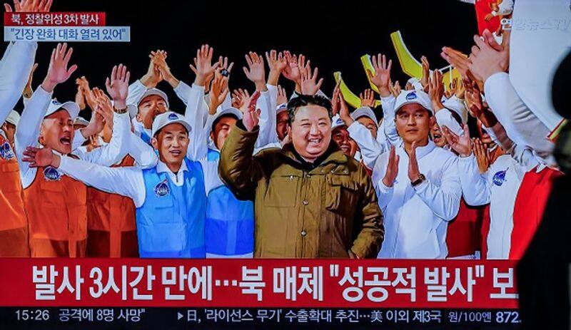 North Korea's spy satellite launch celebration: Kim Jong Un's daughter, scientists don matching t-shirts snt