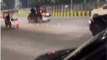 Currency Notes blowing from Cars in noida Uttar Pradesh noida police seized 5 cars after video viral zrua