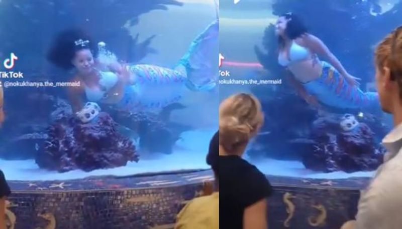 mermaid tail get stuck in water  woman escaping video   