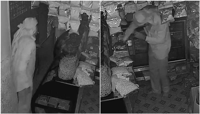 theft case wayanad cctv visuals of thief lighting torch inside shop btb