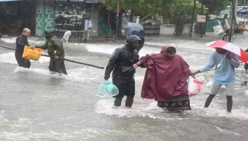 michaung cyclone many places in chennai flooded with rain water emergency number announced ans