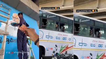 Vijayapura Elderly Man gave money to a young man who was doing Jnanayogi Siddeshwara Shri painting in Sindagi Bypass Bridge Video viral akb