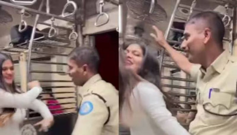 mumbai cop dancing with woman in train video viral booked rlp