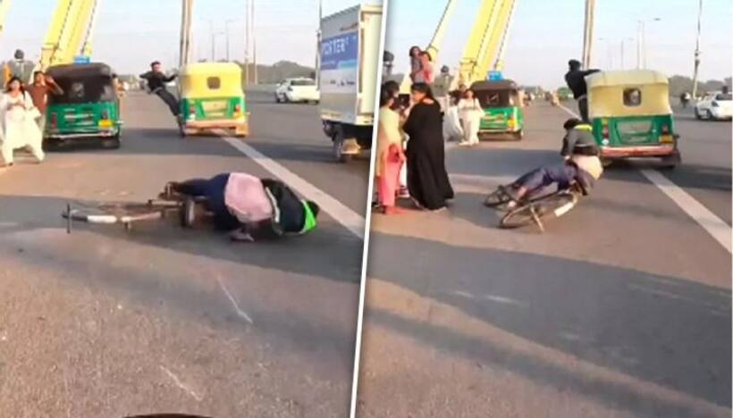 Viral video: Delhi man hits cyclist while performing stunt on Signature bridge in moving auto