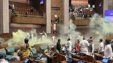 unknown visitor jumped into the lok sabha chamber from the visitor gallery house adjourned kxa 