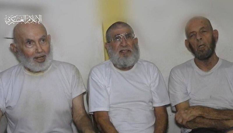 Watch Hamas releases video showing 3 Israeli hostages Israel calls it cruelty against elderly civilians gcw