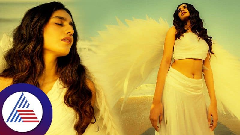 Malayalam Actress Priya Prakash Varrier hot look in white dress, fans comment about navel Vin