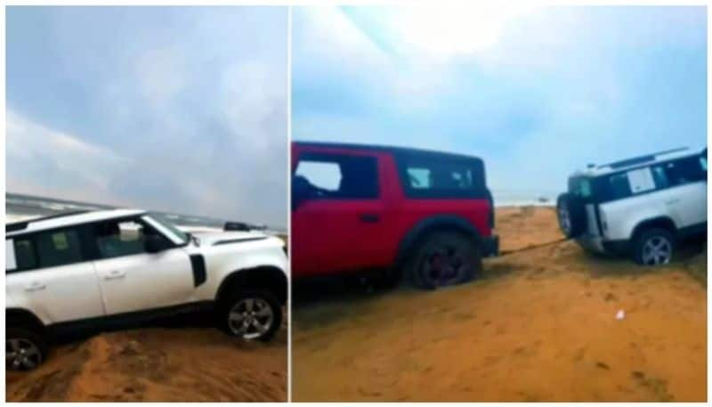 Mahindra Thar rescues two crore rupee Land Rover Defender gets stuck on beach