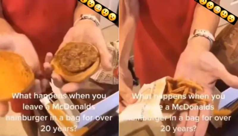 woman showing hamburger that she bought 20 years ago