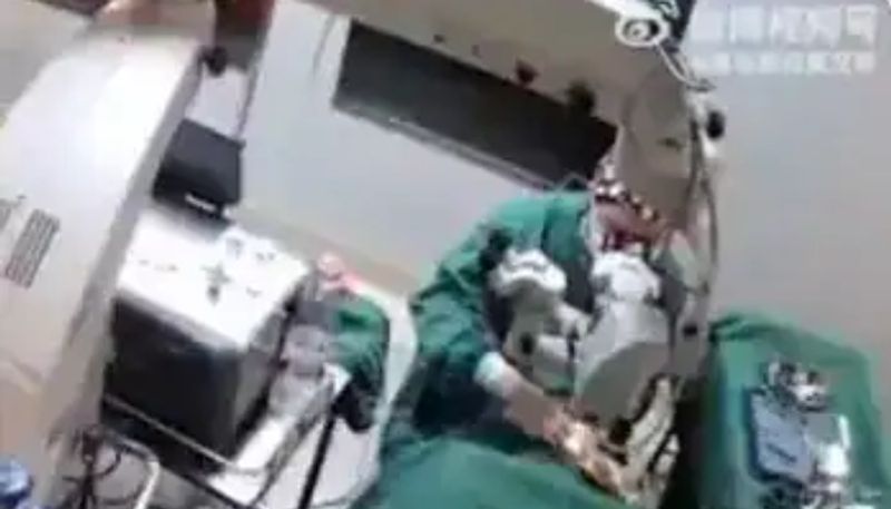 doctor punches patient during surgery the video now going viral