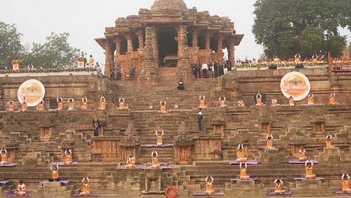 gujarat sets guinness record for performing mass surya namaskar pm modi reacts ash