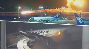 japan plane crash on runway catches fire at tokyo airport kxa