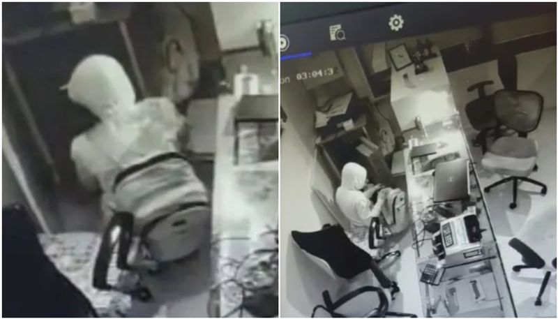 Money Heist Caught On Camera Thief Steals 3 Crore rupees Gold captured CCTV camera inside the Jewellery showroom asd