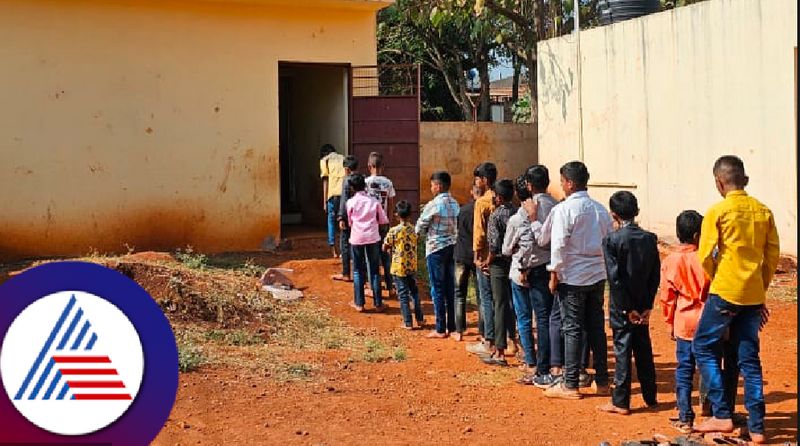 Kannada school children standing in queue for toilet at belagavi rav