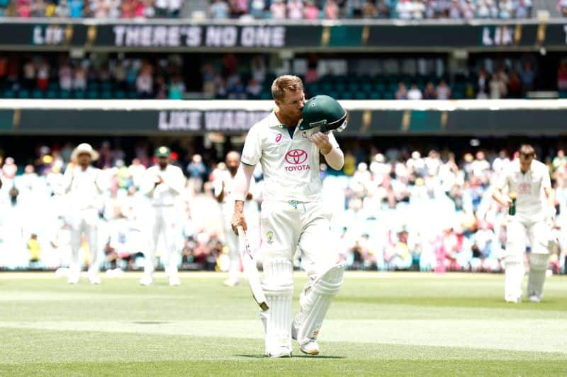 david warner kisses his helmet gives it away to young fan after his last test international innings ash