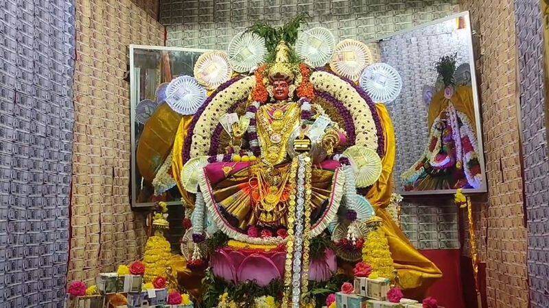 bhagavathi amman decorated with currency notes at manachanallur for festival in trichy vel