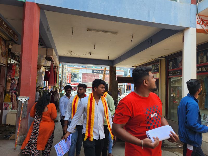 Kannada nameplate: Compulsion through leaflet distribution snr