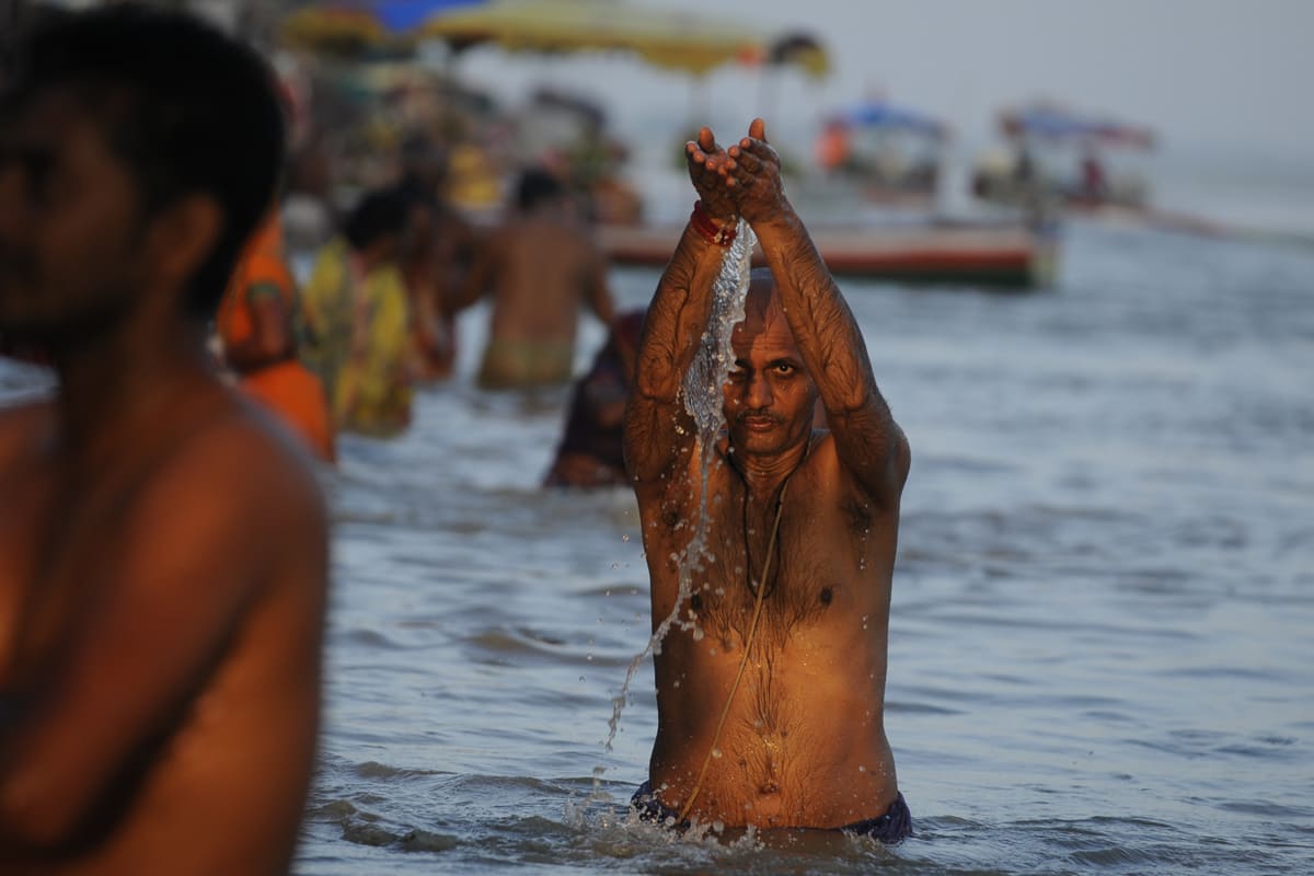 Devotees bath in Sarayu River ahead of Ayodhya Ram Temple consecration gan