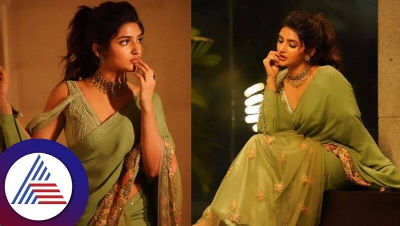 Actress Sreeleela Slays Traditional Look In Green Saree See Beautiful Pics gvd