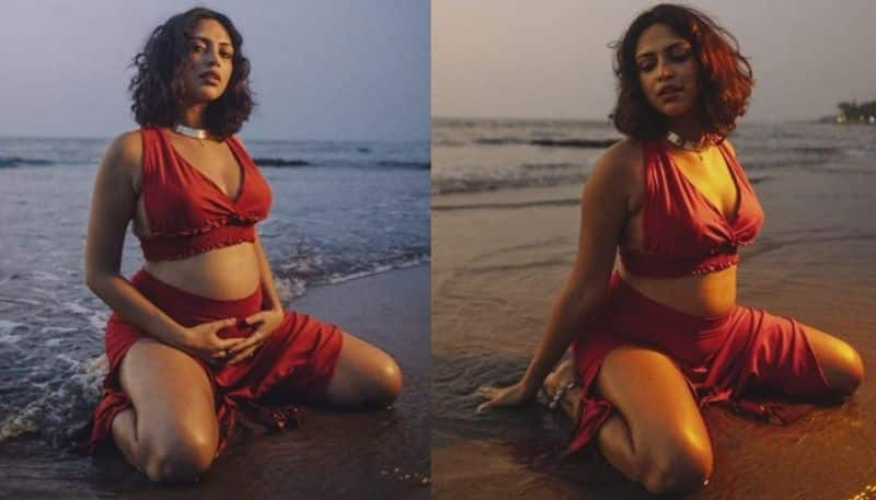 South India Actress Amala Paul baby bump photo shoot on beach sat