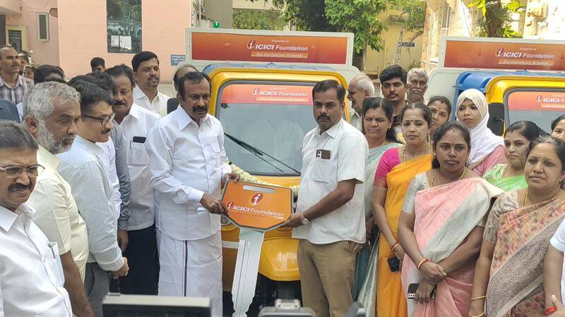 minister muthusamy flagging 10 battery vehicles for cleaning work in coimbatore vel