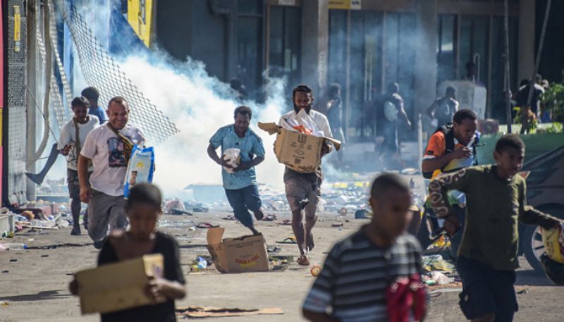 At least 15 dead after major rioting and looting in Papua New Guinea etj