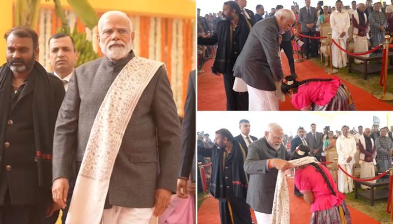 PM Modi gifts his shawl to girl during Pongal celebrations sgb