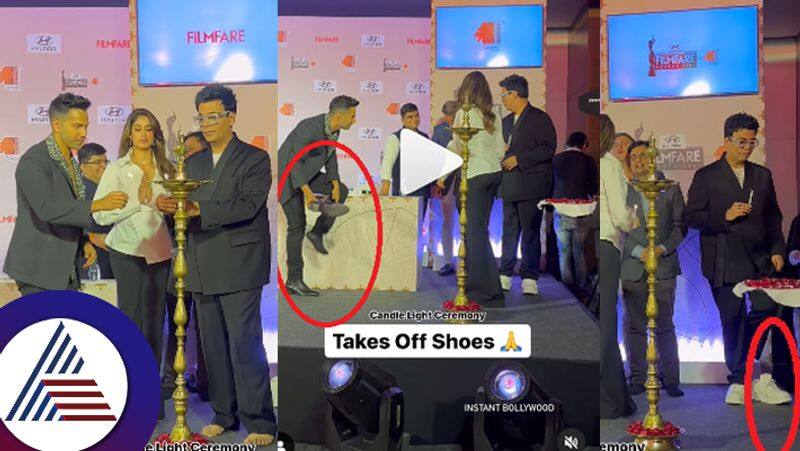 Varun Dhawan Karan Johar Take Off Their Shoes as They Light the Diya at an Event suc