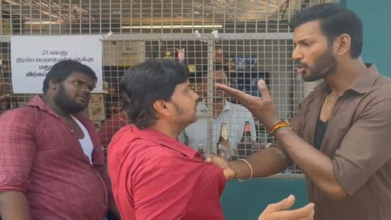 Vishal beaten drunken man who is asking alcohol in Rathnam movie tasmac set gan