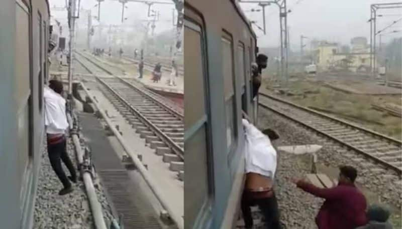 phone snatcher trapped in train window one kilometer rlp 