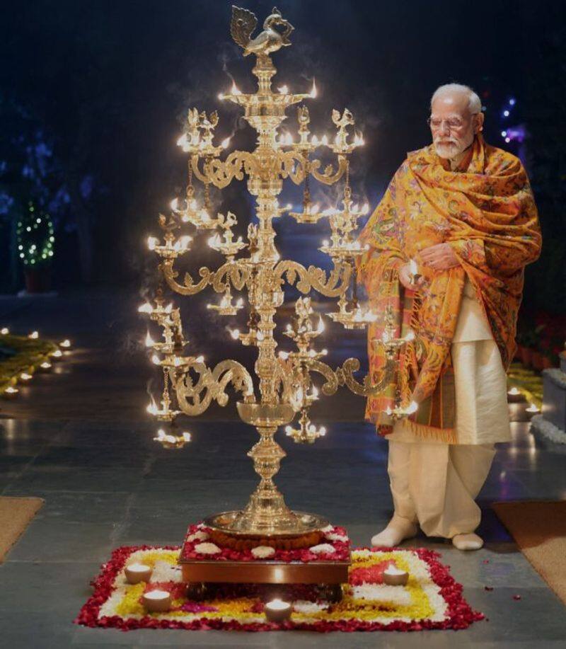 PM Modi lights 'Ramjyoti' at his residence upon returning from Ayodhya