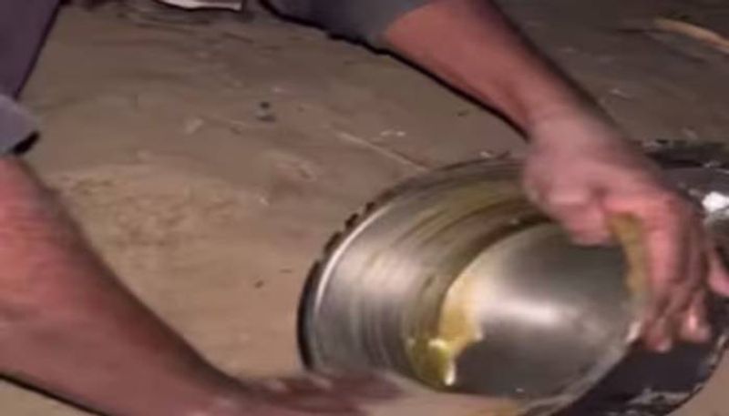 man cleaning utensils without water and soap viral video rlp