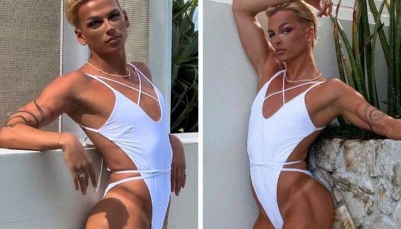 Australian clothing company faces social media backlash after male model poses with Women's swimsuit (WATCH) avv