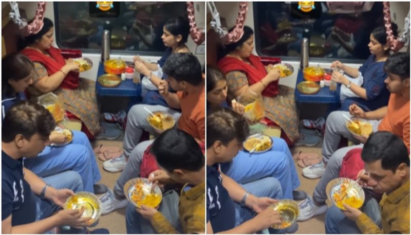 family eats homely food inside train a hilarious discussion ongoing under the video